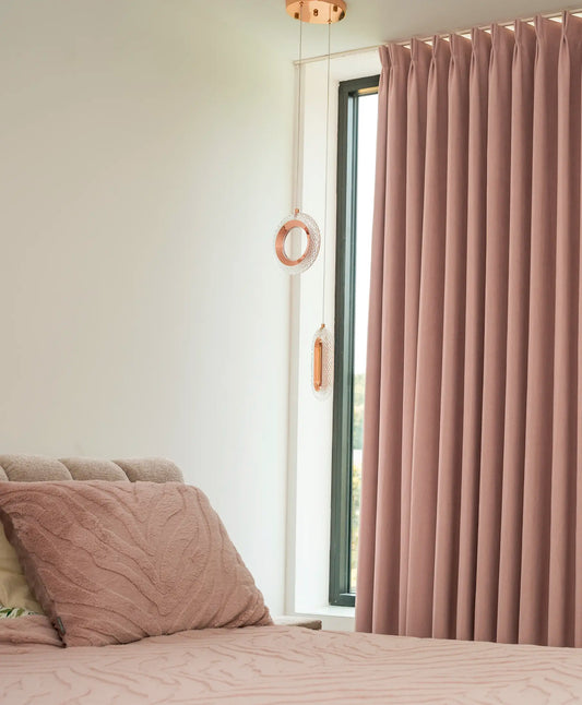 Pink curtain with floral pattern