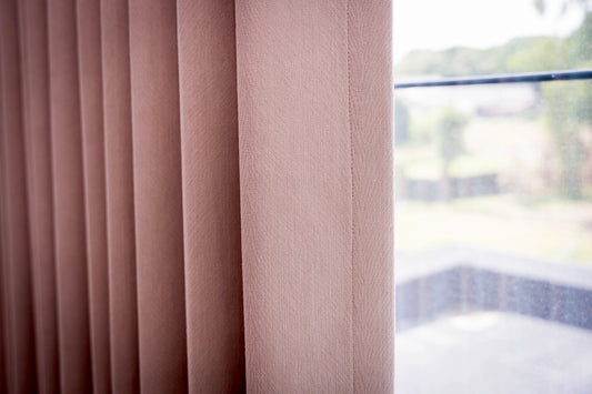 Pink curtain with floral pattern